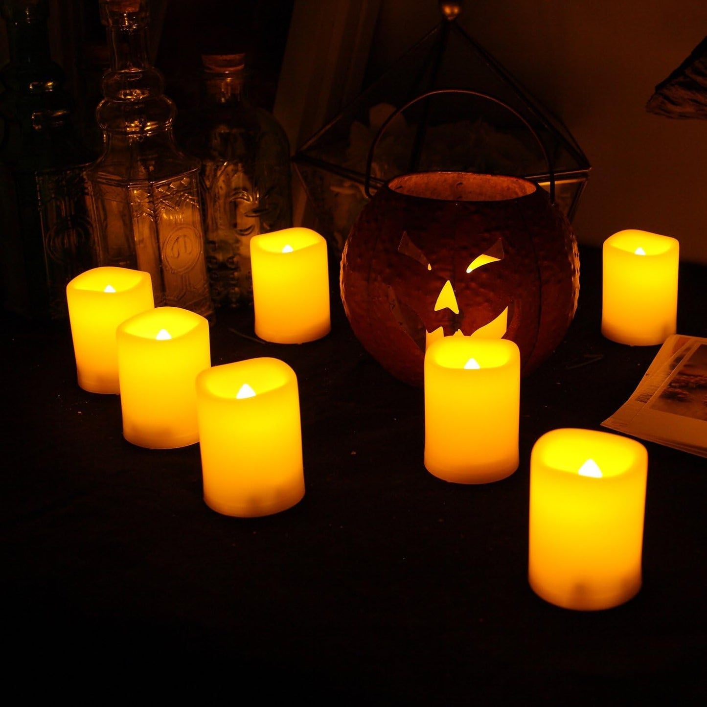 24 PCS Flameless LED Votives - Bright Flickering Battery Operated White Plastic Electric Tea Light Candles for Wedding Table Centerpieces Halloween Jack O’ Lantern Pumpkin Christmas Party Decorations