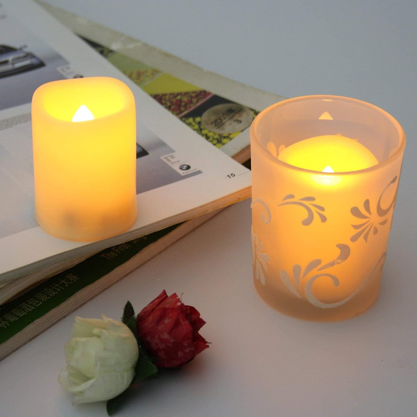 24 PCS Flameless LED Votives - Bright Flickering Battery Operated White Plastic Electric Tea Light Candles for Wedding Table Centerpieces Halloween Jack O’ Lantern Pumpkin Christmas Party Decorations